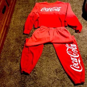 COCA-COLA” two tone red (dark/Light) top is a Sz.Large/Bottoms are a Sz.medium
